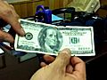 Police Show Fake $100 Bills