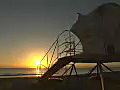 Royalty Free Stock Video HD Footage View of Lifeguard Stand and Fort Lauderdale Beach at Sunrise in Florida