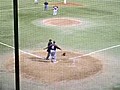 Baseball Player Leaps Over Catcher