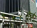 Royalty Free Stock Video HD Footage People Mover Transit Station and High Rise Condos,  Office Buildings as People Mover Car Arrives in Downtown Miami, Florida