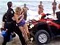 Cop body slams woman on beach