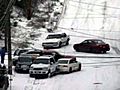 On Camera: Cars Slip,  Slide Away On Icy Hill