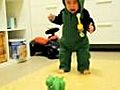 Toddler scared of mini dinosaur