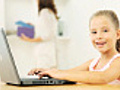 Little Girl Using a Laptop