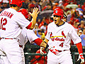 Cards blank Reds,  take division lead