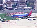 Plane slides off runway at Midway