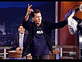 Charlie Sheen Steals Kiss From TV Host