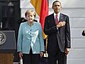 Obama begrüßt Merkel mit Salutschüssen