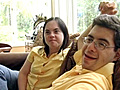 Monica & David - M&D on Couch wearing yellow shirts