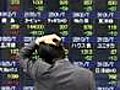 Tokyo stocks plunge,  investors brace for more turmoil