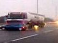 Truck driver caught on film with car stuck to bumper at 60mph