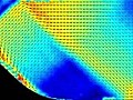 Internal tide generated by a Gaussian ridge