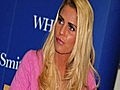 Katie Price Looks Shy At Signing