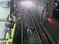 Drunk woman falls on tracks and barely escapes getting hit by train