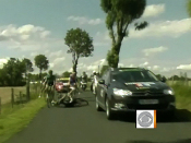 Tour de France riders clipped by news car
