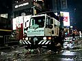 Street cleaners sweep up Times Square