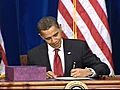 President Obama signs massive stimulus bill