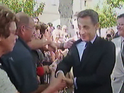 Sarkozy scuffle during handshake tour