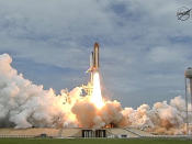 Space Shuttle Atlantis lifts off