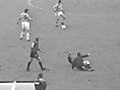 Referee Tackles A Player