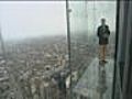 Man on Ledge of Tallest Building