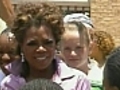 Oprah settles lawsuit with former headmistress