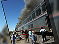Semi collides with Amtrak train,  2 killed
