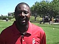 UIC coach Howard Moore hits the links at the Bridges of Poplar Creek