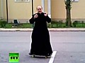 Skateboarding priest becomes sensation