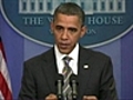 Obama vows to fight top tax cuts in 2012