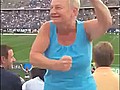 Woman Dances At Football Game