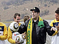 Travolta has a ball with Australian team