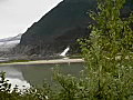 Royalty Free Stock Video SD Footage Zoom Out From a Waterfall at the Mendenhall Glacier Near Juneau,  Alaska