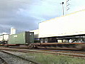 Royalty Free Stock Video HD Footage Freight Train Cars Pass by on the Tracks in Fort Lauderdale,  Florida