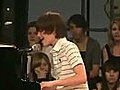 Kid singing paparazzi!