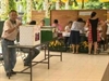 Votes in crucial Thai election divided