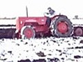 Massive Tractors Ploughing