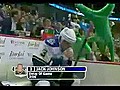 Green Men Heckle Hockey Player