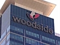 Woodside output,  sales dip, revenue up