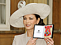 Zeta Jones celebrates CBE honor with Douglas