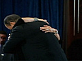 Tiger Woods hugs it out