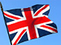 British flag waving in wind against clear blue sky