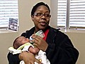 Paralyzed Woman Gives Birth to Son