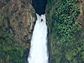 Kayaker plunges down a huge waterfall
