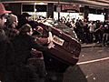 Mob Flips Car