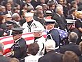 Kennedy’s casket carried into Mission Church