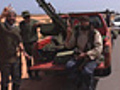 Gaddafi’s Forces Stall Libyan Rebel Advance