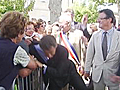 FRANCE: Sarkozy physically attacked during handshake event