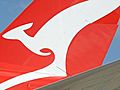 Qantas tries to clear passenger backlog