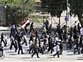 Syrian protesters defy Assad concessions